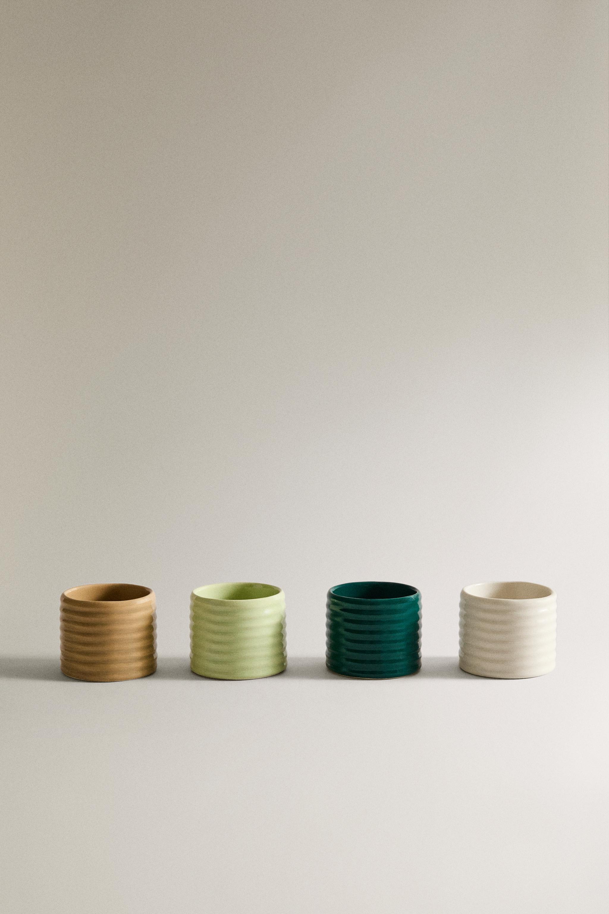 PACK OF CERAMIC NAPKIN HOLDERS WITH RELIEF (PACK OF 4)